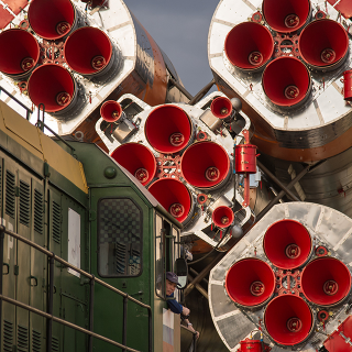 Photo Credit: (NASA/Bill Ingalls) The Soyuz MS-01 spacecraft is rolled out by train to the launch pad at the Baikonur Cosmodrome, Kazakhstan, Monday, July 4, 2016. NASA astronaut Kate Rubins, cosmonaut Anatoly Ivanishin of the Russian space agency Roscosmos, and astronaut Takuya Onishi of the Japan Aerospace Exploration Agency (JAXA) will launch from the Baikonur Cosmodrome in Kazakhstan the morning of July 7, Kazakh time (July 6 Eastern time.) All three will spend approximately four months on the orbital complex, returning to Earth in October.